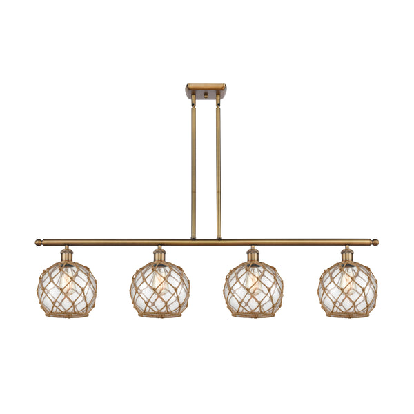 Farmhouse Rope Island Light shown in the Brushed Brass finish with a Clear Glass with Brown Rope shade