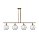 Athens Island Light shown in the Brushed Brass finish with a Clear shade