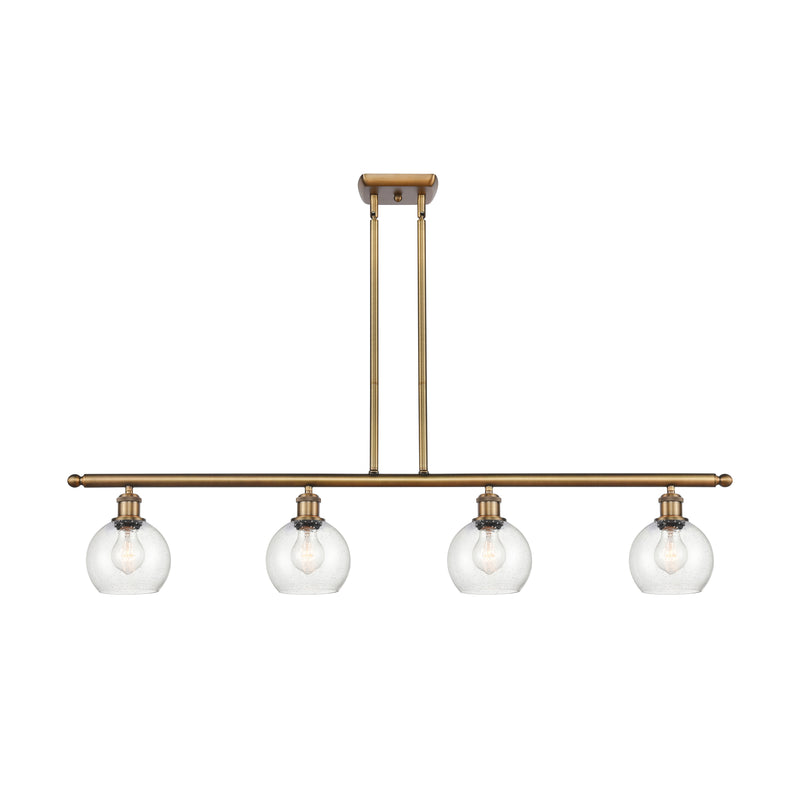 Athens Island Light shown in the Brushed Brass finish with a Seedy shade