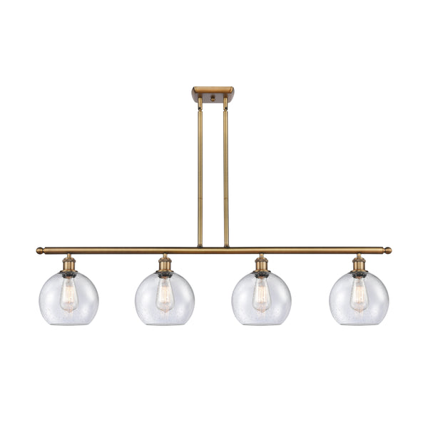 Athens Island Light shown in the Brushed Brass finish with a Seedy shade