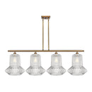 Springwater Island Light shown in the Brushed Brass finish with a Clear Spiral Fluted shade