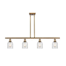 Caledonia Island Light shown in the Brushed Brass finish with a Mica shade