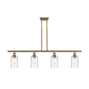 Candor Island Light shown in the Brushed Brass finish with a Clear Waterglass shade