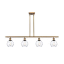 Waverly Island Light shown in the Brushed Brass finish with a Clear shade