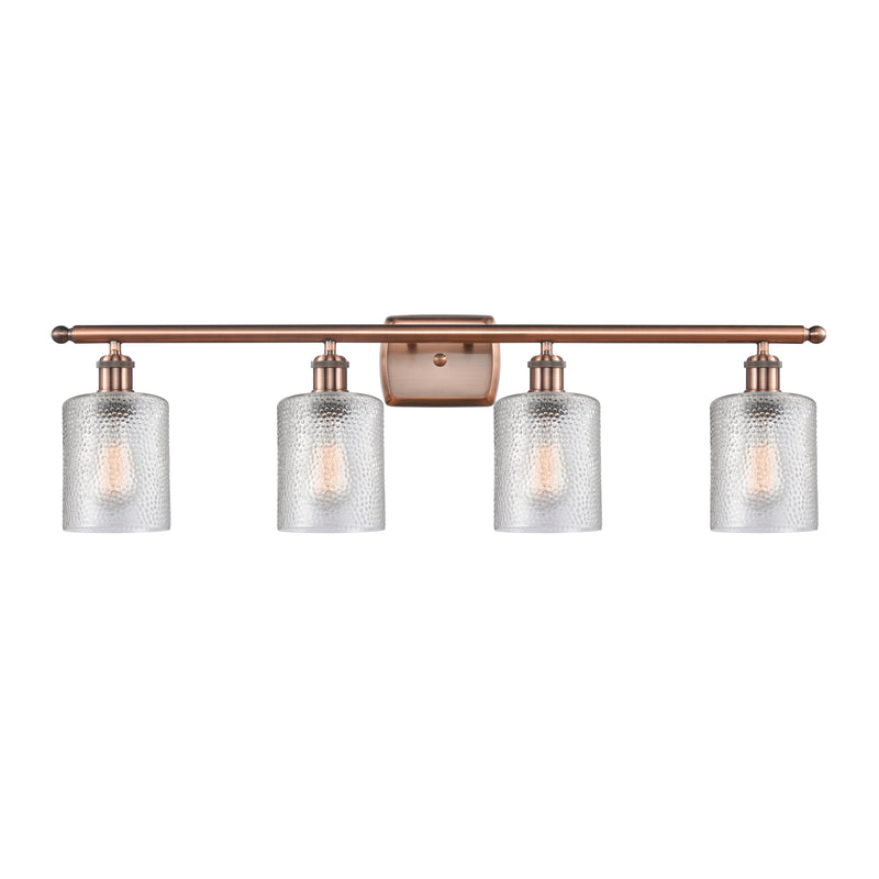 Cobbleskill Bath Vanity Light shown in the Antique Copper finish with a Clear shade