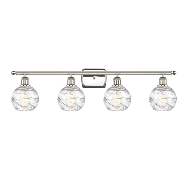 Deco Swirl Bath Vanity Light shown in the Polished Nickel finish with a Clear shade