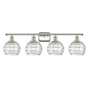 Deco Swirl Bath Vanity Light shown in the Polished Nickel finish with a Clear shade