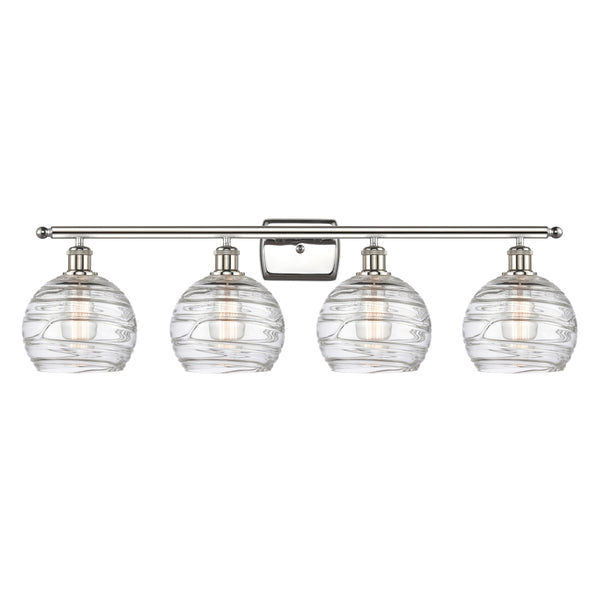 Deco Swirl Bath Vanity Light shown in the Polished Nickel finish with a Clear shade