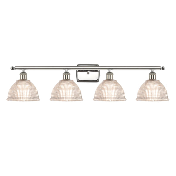 Arietta Bath Vanity Light shown in the Polished Nickel finish with a Clear shade