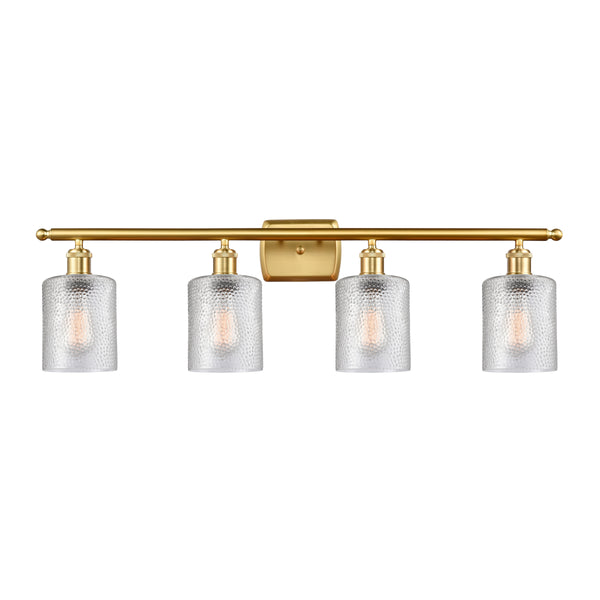 Cobbleskill Bath Vanity Light shown in the Satin Gold finish with a Clear shade