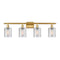 Cobbleskill Bath Vanity Light shown in the Satin Gold finish with a Clear shade