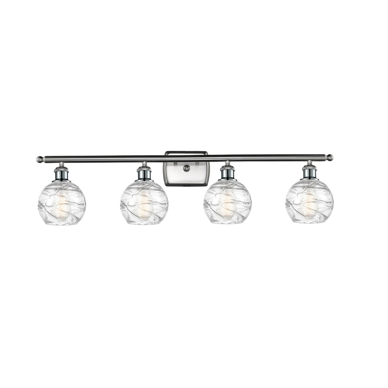 Deco Swirl Bath Vanity Light shown in the Brushed Satin Nickel finish with a Clear shade