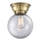Beacon Flush Mount shown in the Antique Brass finish with a Clear shade