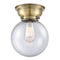 Beacon Flush Mount shown in the Antique Brass finish with a Seedy shade