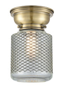 Stanton Flush Mount shown in the Antique Brass finish with a Clear Wire Mesh shade