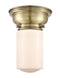 Dover Flush Mount shown in the Antique Brass finish with a Matte White shade