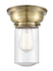 Dover Flush Mount shown in the Antique Brass finish with a Seedy shade