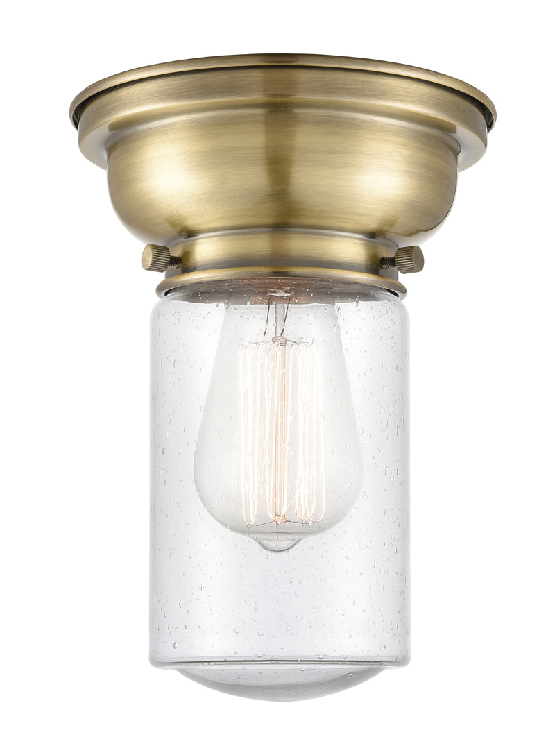 Dover Flush Mount shown in the Antique Brass finish with a Seedy shade
