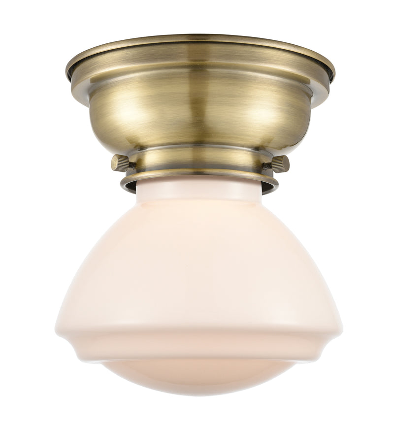 Olean Flush Mount shown in the Antique Brass finish with a Matte White shade