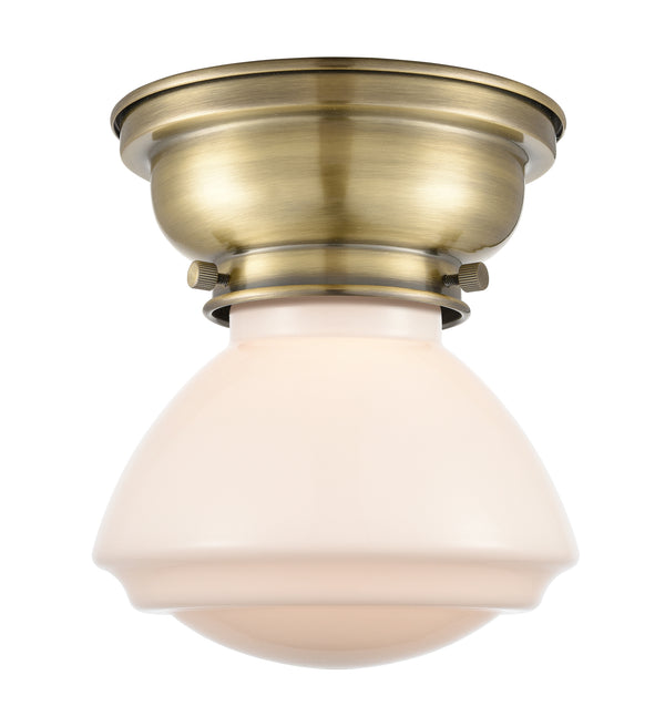 Olean Flush Mount shown in the Antique Brass finish with a Matte White shade