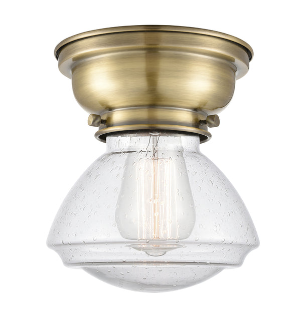 Olean Flush Mount shown in the Antique Brass finish with a Seedy shade