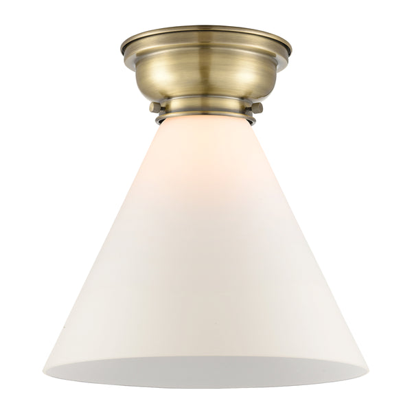 Cone Flush Mount shown in the Antique Brass finish with a Matte White shade