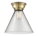 Cone Flush Mount shown in the Antique Brass finish with a Clear shade