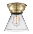 Cone Flush Mount shown in the Antique Brass finish with a Clear shade