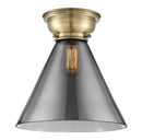 Cone Flush Mount shown in the Antique Brass finish with a Plated Smoke shade