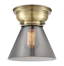 Cone Flush Mount shown in the Antique Brass finish with a Plated Smoke shade