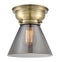 Cone Flush Mount shown in the Antique Brass finish with a Plated Smoke shade
