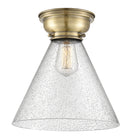Cone Flush Mount shown in the Antique Brass finish with a Seedy shade