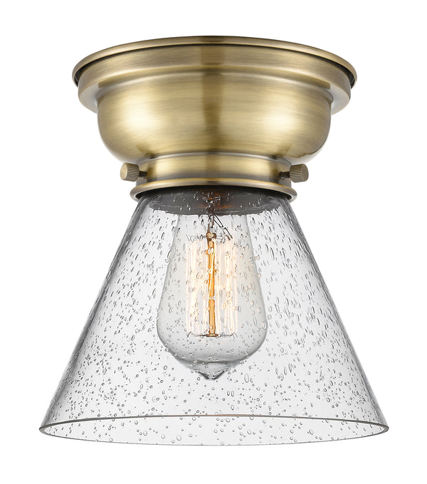 Cone Flush Mount shown in the Antique Brass finish with a Seedy shade
