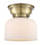 Bell Flush Mount shown in the Antique Brass finish with a Matte White shade