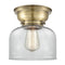 Bell Flush Mount shown in the Antique Brass finish with a Clear shade