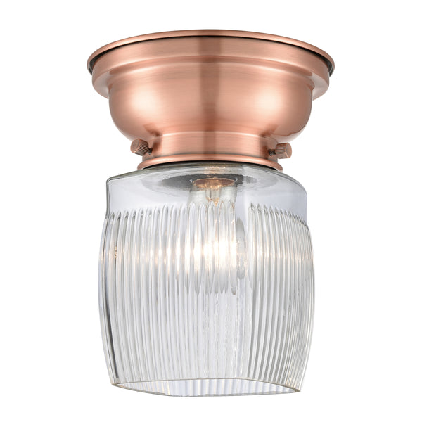 Colton Flush Mount shown in the Antique Copper finish with a Clear Halophane shade