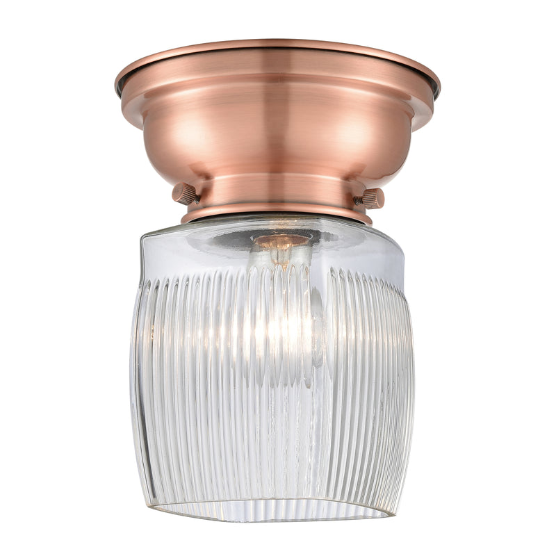 Colton Flush Mount shown in the Antique Copper finish with a Clear Halophane shade