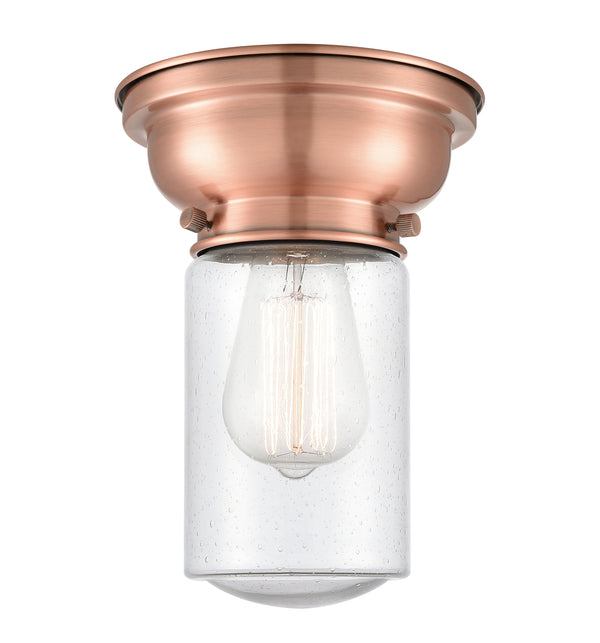 Dover Flush Mount shown in the Antique Copper finish with a Seedy shade