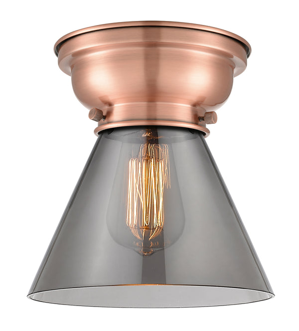 Cone Flush Mount shown in the Antique Copper finish with a Plated Smoke shade