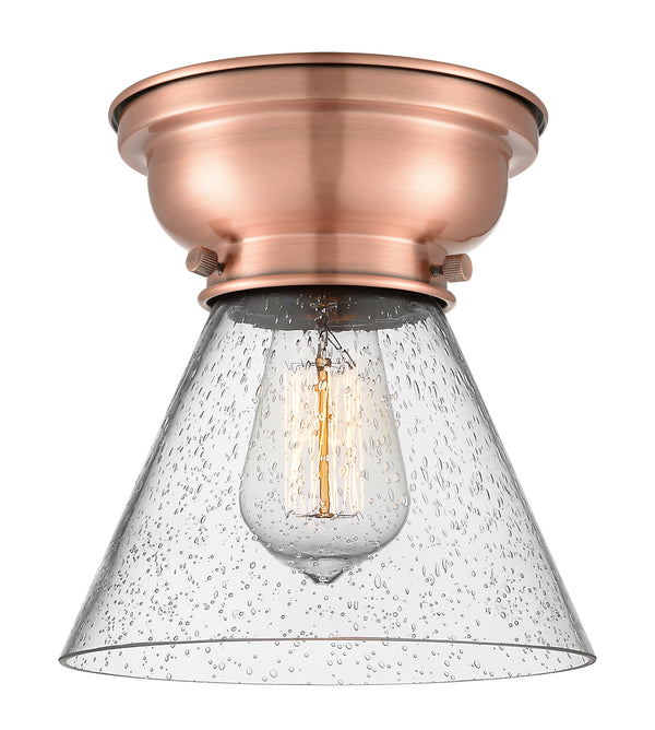 Cone Flush Mount shown in the Antique Copper finish with a Seedy shade