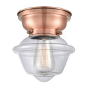 Oxford Flush Mount shown in the Antique Copper finish with a Clear shade