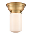 Dover Flush Mount shown in the Brushed Brass finish with a Matte White shade
