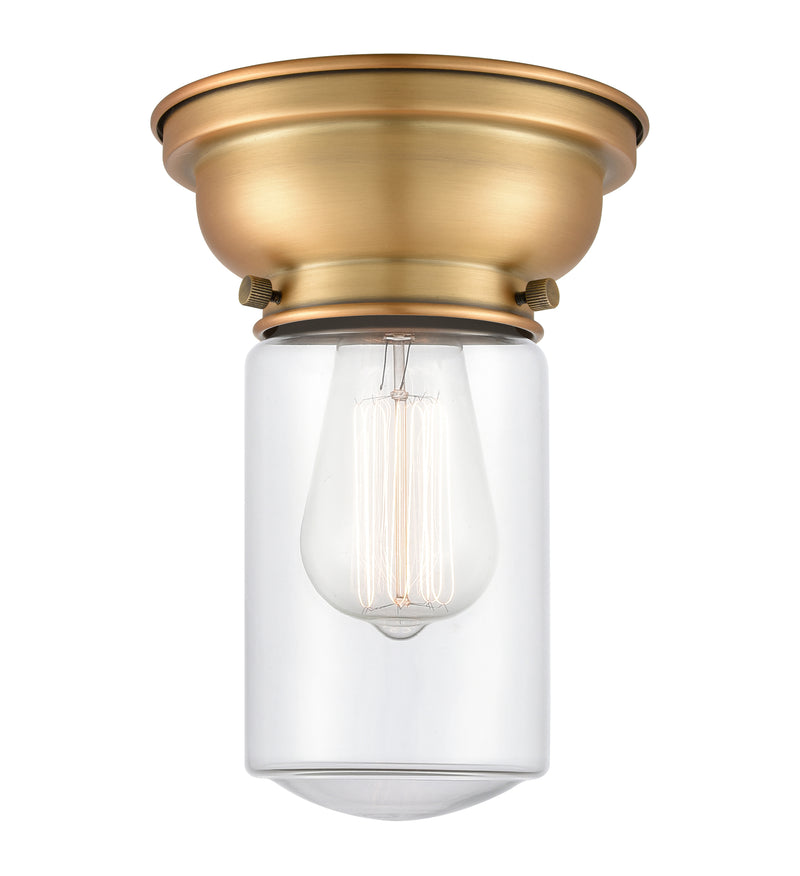 Dover Flush Mount shown in the Brushed Brass finish with a Clear shade