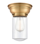 Dover Flush Mount shown in the Brushed Brass finish with a Clear shade