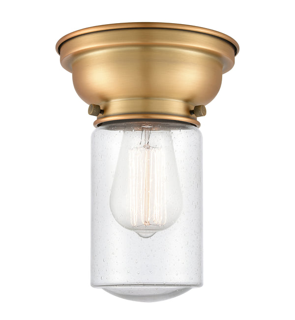 Dover Flush Mount shown in the Brushed Brass finish with a Seedy shade
