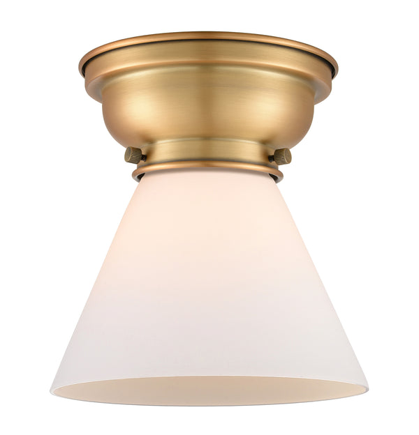 Cone Flush Mount shown in the Brushed Brass finish with a Matte White shade