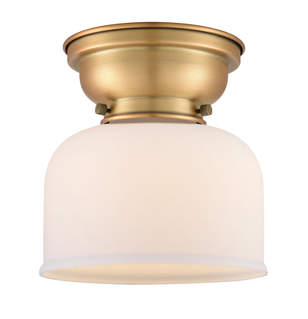 Bell Flush Mount shown in the Brushed Brass finish with a Matte White shade