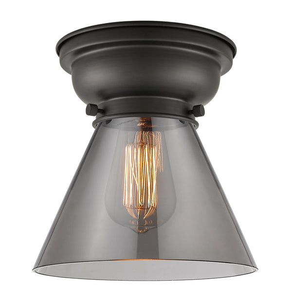 Cone Flush Mount shown in the Matte Black finish with a Plated Smoke shade