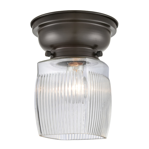 Colton Flush Mount shown in the Oil Rubbed Bronze finish with a Clear Halophane shade
