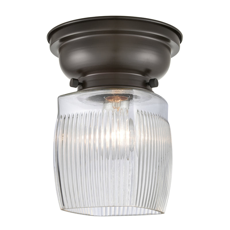 Colton Flush Mount shown in the Oil Rubbed Bronze finish with a Clear Halophane shade